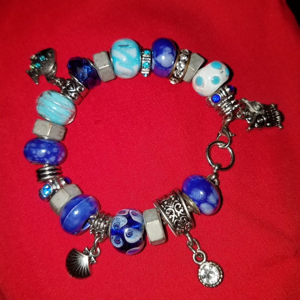 A blue and silver charm bracelet